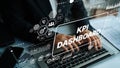 Business professional analyzing data on a KPI dashboard with modern technology and digital graphics in a corporate Royalty Free Stock Photo
