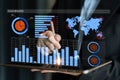 Business Professional Analyzing Data on Tablet with Digital Dashboard Visualizations and Charts in Modern Office Royalty Free Stock Photo