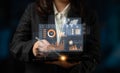 Business professional analyzing financial data with digital tablet displaying interactive graphs and charts in modern Royalty Free Stock Photo