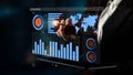 Business professional analyzing interactive data dashboard with graphs, charts, and world map in a modern office setting Royalty Free Stock Photo