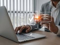 Business Professional Completing Virtual Task Checklist on Laptop Interface Royalty Free Stock Photo