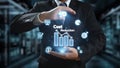 Business professional demonstrating cost reduction strategies with data visualization and digital icons representing Royalty Free Stock Photo