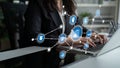 Business Professional Using Laptop with Digital Interface and Icons Representing Networking, Technology, and Data Royalty Free Stock Photo