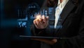 Business professional interacting with futuristic data visualization on tablet screen, digital graphs, and analytics in Royalty Free Stock Photo