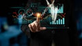 Business Professional Interacting with Futuristic Data Visualization on Touchscreen Interface in Modern Office Royalty Free Stock Photo