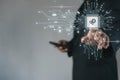 Business professional interacting with artificial intelligence chip interface, symbolizing advanced cybersecurity, data protection Royalty Free Stock Photo