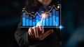 Business Professional Interacting with Digital Analytics Display Featuring Graphs and Data Visualizations in a Modern Royalty Free Stock Photo