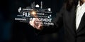 Business professional interacting with digital file management concepts including cloud storage, synchronization, and Royalty Free Stock Photo