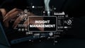 Business professional interacting with digital interface representing insight management concepts and data visualization Royalty Free Stock Photo