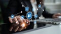Business professional interacting with digital network symbols on a touchscreen interface to illustrate technology Royalty Free Stock Photo