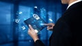 Business professional interacting with futuristic technology on tablet device, showcasing data analysis and digital Royalty Free Stock Photo