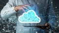 Business professional using digital tablet with cloud technology graphics illustrating data management and networking Royalty Free Stock Photo