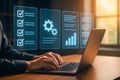 Business professional managing workflow checklist and analytics dashboard on laptop Royalty Free Stock Photo