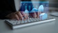 Business Professional Using Keyboard with Integrated Digital Analytics Display Showing Charts and Graphs for Data Royalty Free Stock Photo