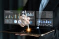 Business Professional Using Digital Tablet for Data Management with Interactive Graphs and Charts in a Modern Office Royalty Free Stock Photo
