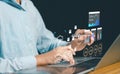 Business professional using laptop with AI analytics dashboard, data visualization, performance metrics, and security icons Royalty Free Stock Photo