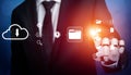 Business Professional Using Robotic Hand to Interact with Digital Icons Representing Cloud Computing, Data Security, and Royalty Free Stock Photo