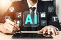 Business Professional Using Tablet with AI Technology Icons, Digital Innovation Concept, Futuristic Interface, Creative Royalty Free Stock Photo