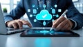 Business professional using tablet and stylus with cloud computing interface and icons technology and data management concept Royalty Free Stock Photo