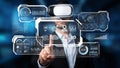Business professional using virtual reality technology to interact with futuristic data visualizations and graphs in an Royalty Free Stock Photo