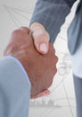 Business professionals shaking hands on technology background Royalty Free Stock Photo