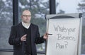 Business Professor leads a brain-storming discussion in a classroom