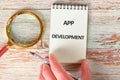 Business, programming, interface, application and network concept. Text APP DEVELOPMENT in a notebook against the Royalty Free Stock Photo