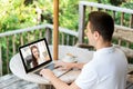 Man having video call with operator on laptop Royalty Free Stock Photo