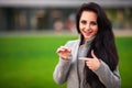 Business, real estate, banking and people concept - smiling business woman with keys over office room or new apartment background Royalty Free Stock Photo