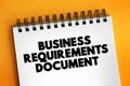 Business Requirements Document - business solution for a project, text concept on notepad