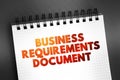 Business Requirements Document - business solution for a project, text on notepad, concept background