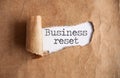 Business reset torn paper reveal Royalty Free Stock Photo