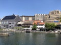 Business and residential buildings along the Limmat River in the city of Zurich Royalty Free Stock Photo