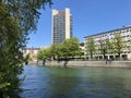 Business and residential buildings along the Limmat River in the city of Zurich Royalty Free Stock Photo