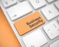 Business Security - Message on the Orange Keyboard Button. 3D. Royalty Free Stock Photo