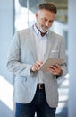 Business, senior man and digital tablet in office for research, communication and planning. Internet, search and elderly Royalty Free Stock Photo