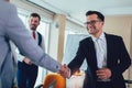 Business shaking hand with a client in office Royalty Free Stock Photo