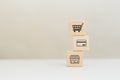 Business shopping online concept, wooden cubes block with shopping icons, e-business purchase marketing consumer Royalty Free Stock Photo