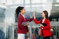 Business Show me the joy hi five hands With women executives celebrating the success in city Outside Office