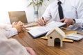 Business Signing a Contract Buy - sell house, insurance agent an Royalty Free Stock Photo