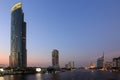 The business skyscraper on Satorn road in city downtown at sunset time.