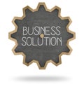Business solution on gear shape blackboard