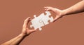 Hand connecting jigsaw puzzle. Business solutions, success and strategy concept. Man hands connecting couple puzzle Royalty Free Stock Photo