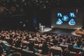 Business speaker giving a talk in conference hall. Royalty Free Stock Photo