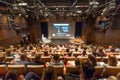 Business speaker giving a talk in conference hall. Royalty Free Stock Photo