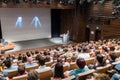 Business speaker giving a talk in conference hall. Royalty Free Stock Photo