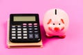 Business start up. piggy bank with calculator. Moneybox. bookkeeping. financial report. saving money. First salary Royalty Free Stock Photo