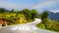 Journey to new year 2023 on asphalt road surface Royalty Free Stock Photo