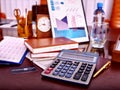 Business still life with calculator on table in Royalty Free Stock Photo