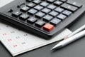 Business still life with calculator on table in office. Royalty Free Stock Photo